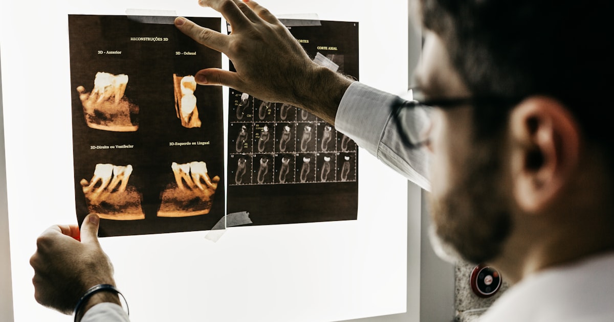 Dental professional preparing for a patient examination